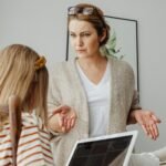 Mother talking with her daughter