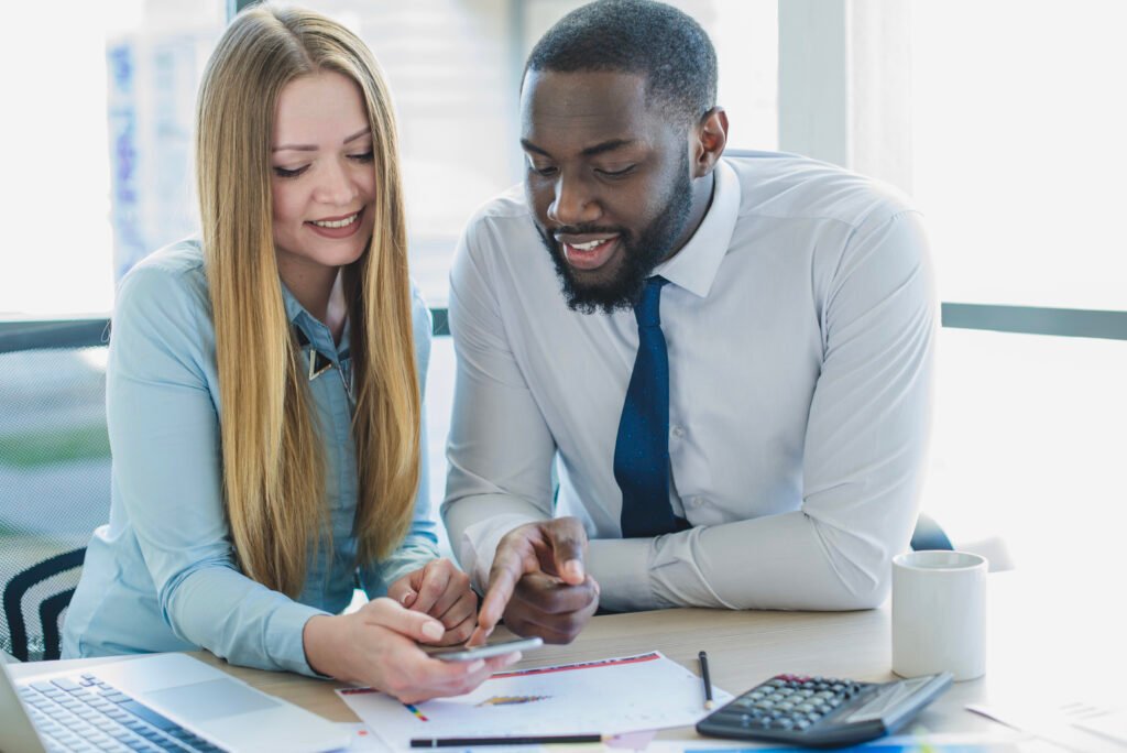 a male and female discussing financial items
