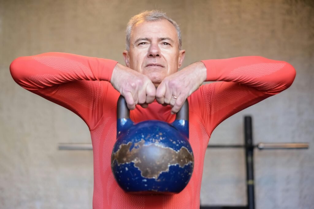 old man lifting weights