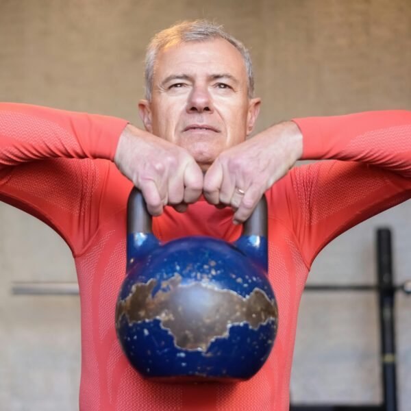 old man lifting weights