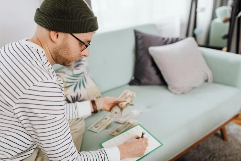 A man working on his budget plan