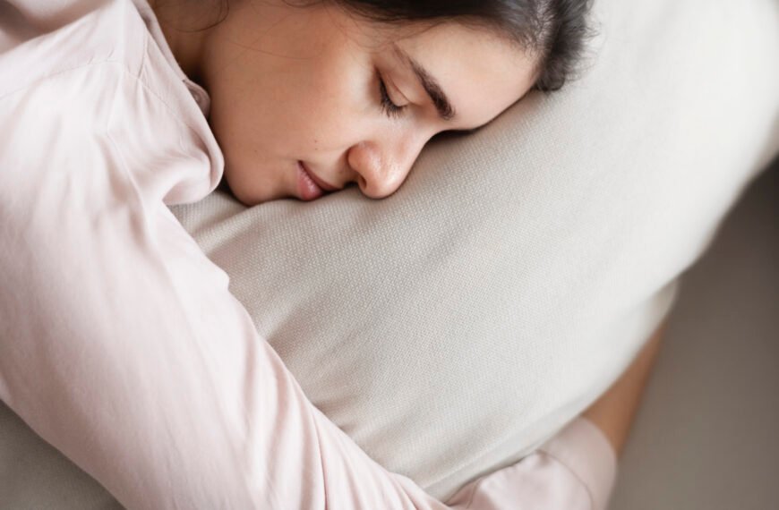 women sleeping on a pillow