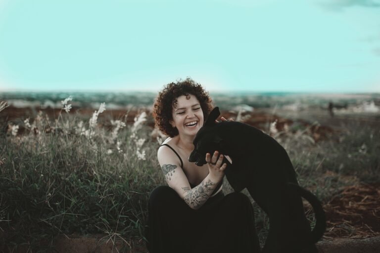 Women playing with her dog