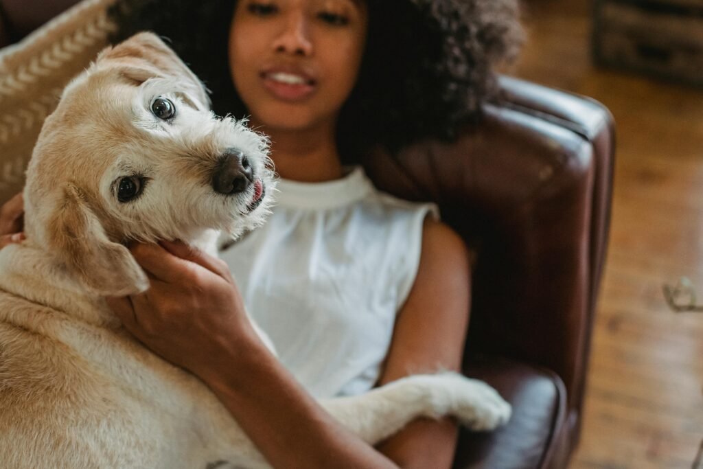 woman with a dog on a couch
