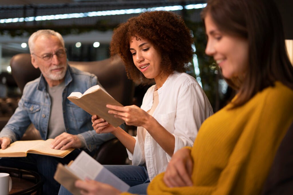 Women ready a story to others