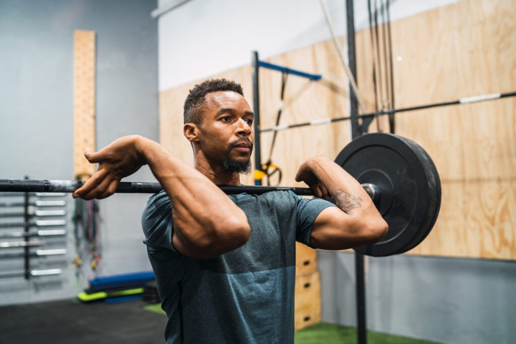 Athlete doing exercise with a barbell.