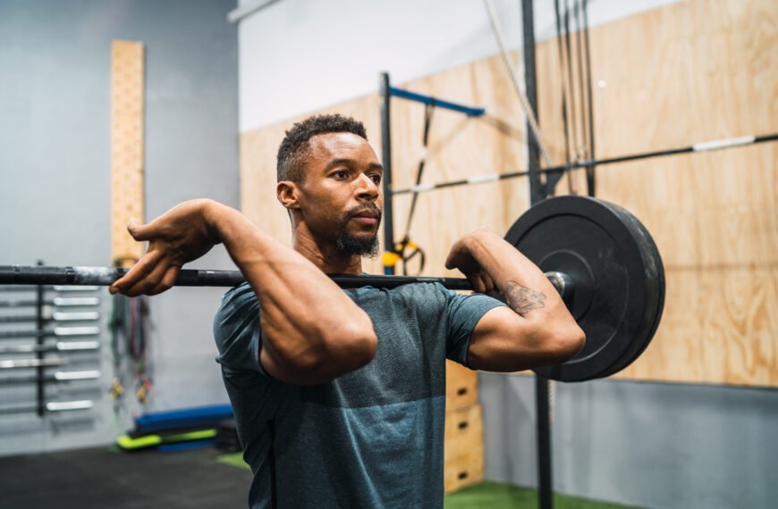 Athlete doing exercise with a barbell.