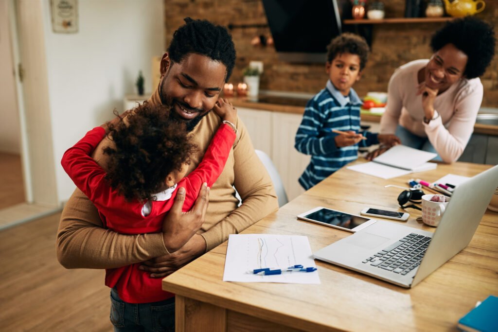 Man surrounded by family analyzing investment options and strategies