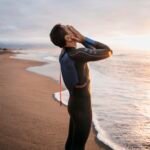 Self-doubting man at the beach