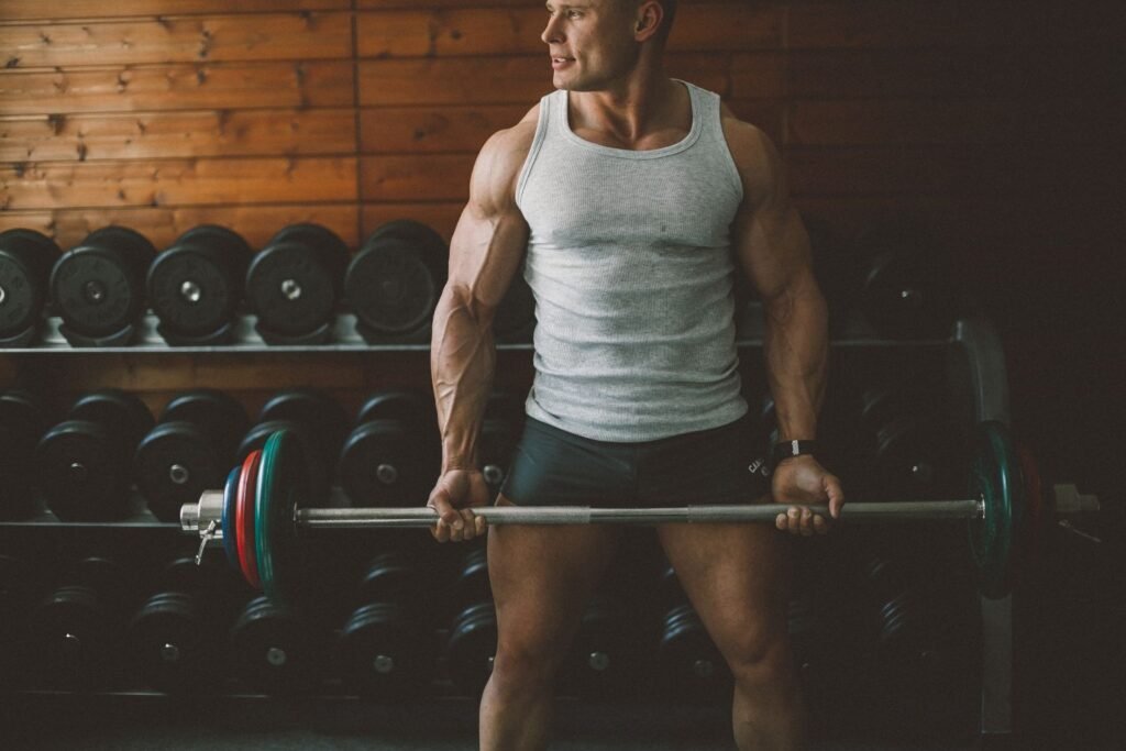 man working out with a barbell in the gym