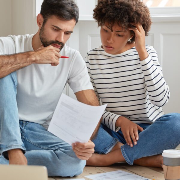 couple thinking about paying off their debt