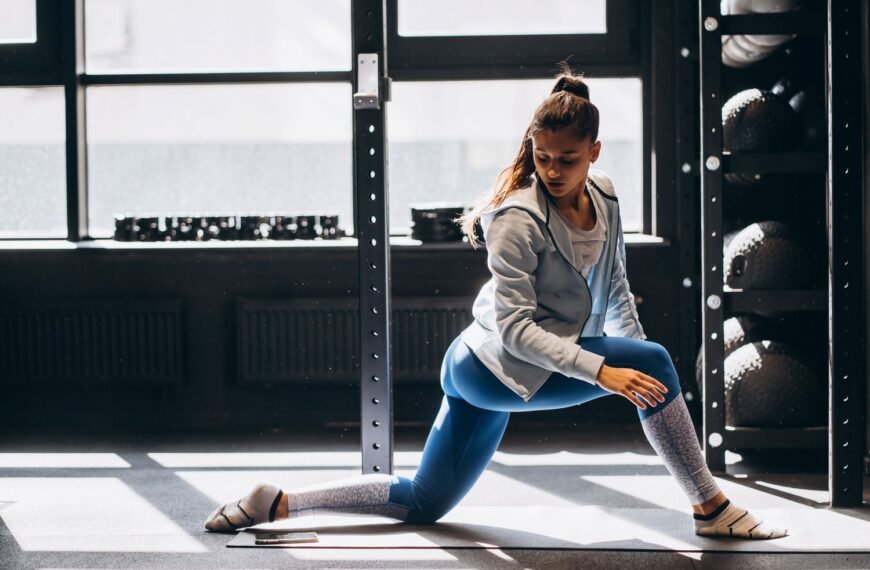 young woman working out in the gym